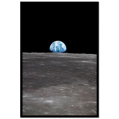 Poster mit Rahmen - Earthrise - View of Earth rising over Moon&#039;s horizon taken from Apollo 11 spacecraft 
